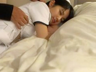 Naughty nurse fucks pervy patient's cock in steamy Tokyo porn video.